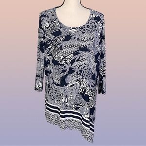 CHICO’S black & white abstract, asymmetrical jersey blouse. Size “3”=XL/16. EUC